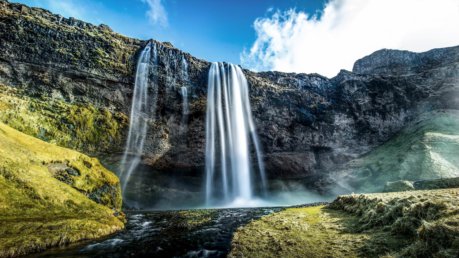 Waterfall cliff stream river water